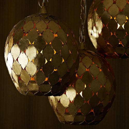Handcrafted pendant with rustic diamond shaped antique gold finish leaves are pieced together to form a dome