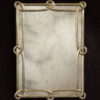 Rectangular carved wood mirror with antiqued silverleaf finish and antiqued mirror, available at www.InvitingHome.com