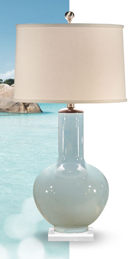 Handcrafted porcelain table lamp;  This gorgeous lamp has hand glazed ocean blue finish; available at InvitingHome.com