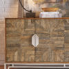 Pecan finished credenza featuring coco fiber inlaid door fronts with nickel base and hardware
