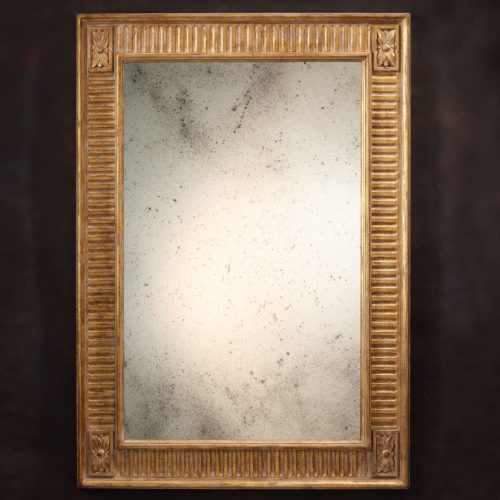 18th century French style carved wood rectangular mirror with antiqued goldleaf finish and antiqued glass; hand-crafted in Italy, available at www.InvitingHome.com