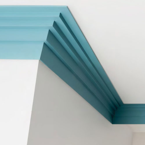 The Chicago features chambered corners at the top and bottom that create a subtle line of shadow that further accentuates the linear pattern; large modern crown molding
