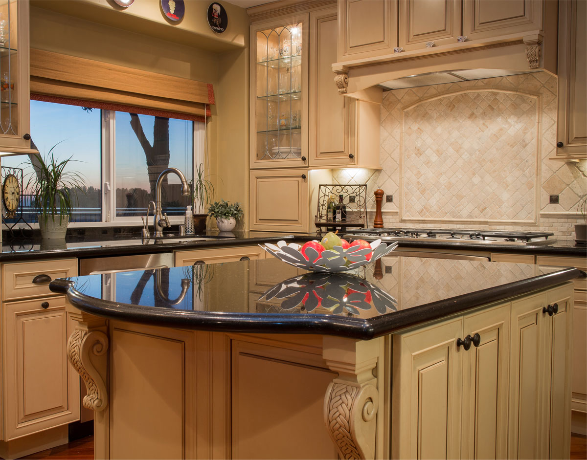 elegant traditional kitchen design featuring carved wood corbels; kitchen design ideas; kitchen decor inspiration