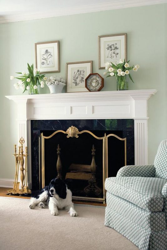 Classic interior with well appointed fireplace mantel; fireplace decorating ideas; interior design inspiration