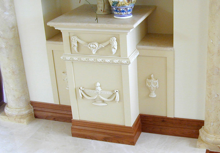 custom made cabinet with varved wood onlays