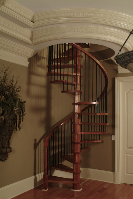 flexible crown molding design around spiral staircase; flexible molding inspiration; interior design ideas