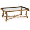 18th-century Tuscan style carved wood coffee table. The main design feature of this Tuscan table is carved in deep relief and highlighted with antique gold leaf scrolled acanthus leaves. This coffee table is hand-made in Italy