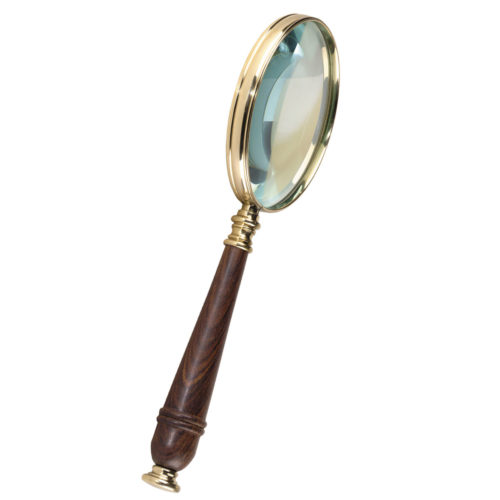 This magnifying glass is hand-made of turned wood with brass finial, ground and polished glass 3x magnifies.