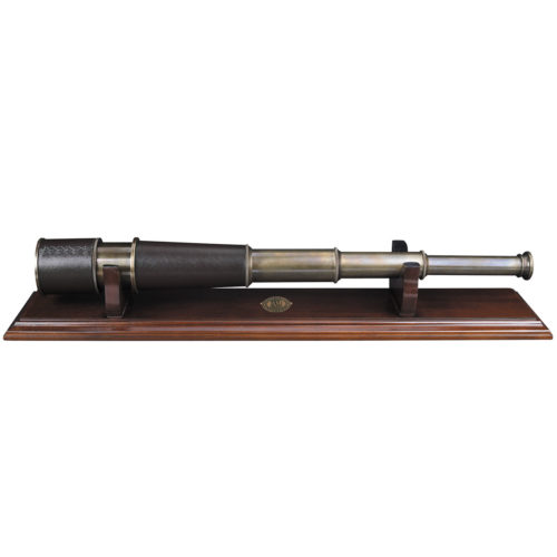 Spyglass telescope made to store away as small as possible this is a marvel of hand tooled telescoping brass tubes.