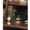 The original desk bell of the Sailor's Inn now comes in duotone bronze. Call the desk agent, request First Class service only. A bell with history.