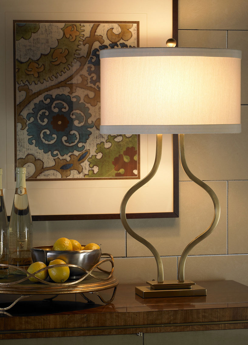 Elegant contemporary hand cast solid brass table lamp in antique finish; available at InvitingHome.com