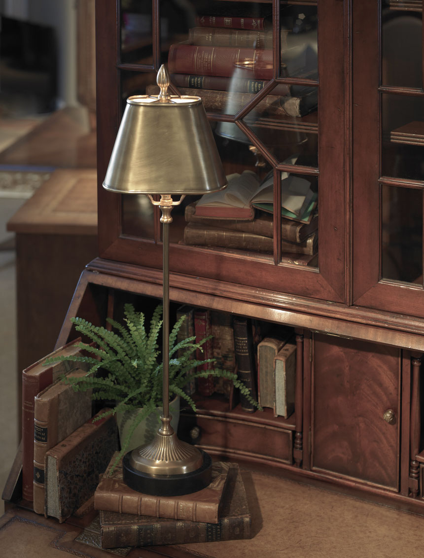lovely library setting with hand-crafted cast brass lamp with solid brass shade; home office lighting ideas
