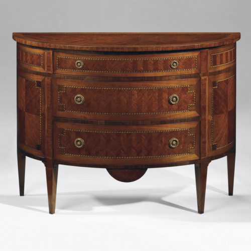 Louis XVI style inlaid half-round chests available in two sizes. Louis XVI chests have three drawer and finished in mahogany veneer inlaid with maple, cherry and palissander wood. The drawers have antiqued brass hardware and varese paper lining. This inlaid chests are hand-made in Italy