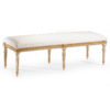 Louis XVI style carved beech wood bench with hand-painted antiqued white finish. antiqued gold leaf accents and off-white muslin upholstery. This bench is hand-crafted in Italy