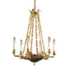 Solid cast brass Empire style chandelier with six-light. Chandelier finished in in French gold with antique bronze accents