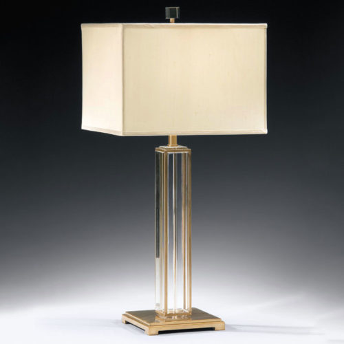 Solid crystal lamp with antiqued solid brass trim. Crystal lamp has square hardback fabric shade;