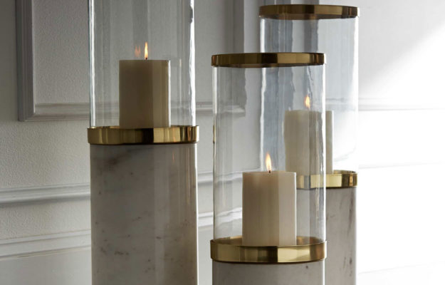 hurricane lamps; Solid white marble and polished brass are the perfect pairings in this sophisticated hurricane design