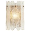 awesome and modern etched glass sconce. Sconce has seedy glass and one light, perfect for accent lighting or down a hallway.