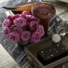 coffee table topped with elegant accessories, featuring authentic horn with crystal globe accents; decorating ideas; interior decor inspiration