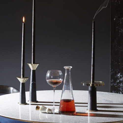 Elegant able setting with black candles and candle-holders; black decor inspiration; moody decorating ideas