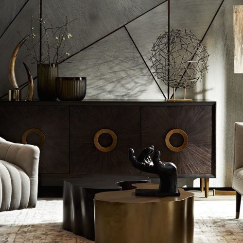 elegant contemporary living room with stunning decorative accessories, with brass and gold accents.