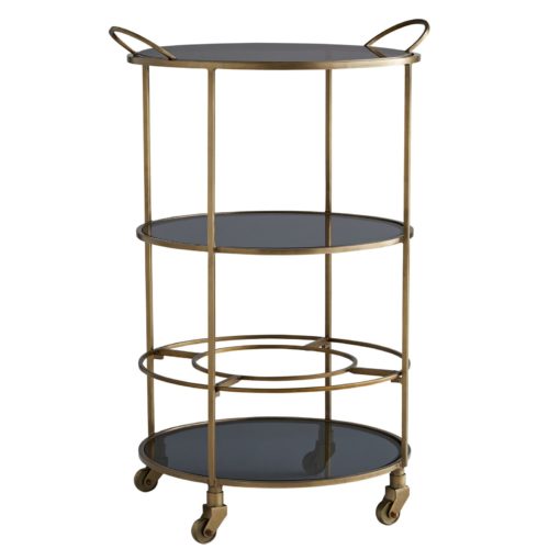 . A minimalistic, antique brass-finished iron frame features three-tiered, black glass shelves to stylishly stow mixers and hors d'oeuvres.The top tray is removable and the circular bottom rack is designed to hold bottles