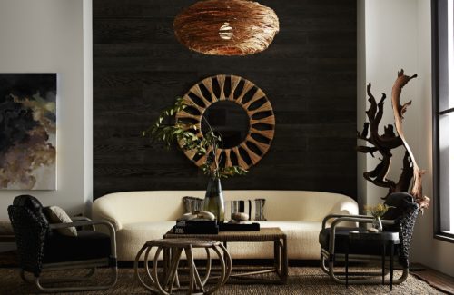 modern living room featuring black marble accent table with natural accents of driftwood sculpture, and organic hues of earth tones. Beautiful way to express your global inspired living space.