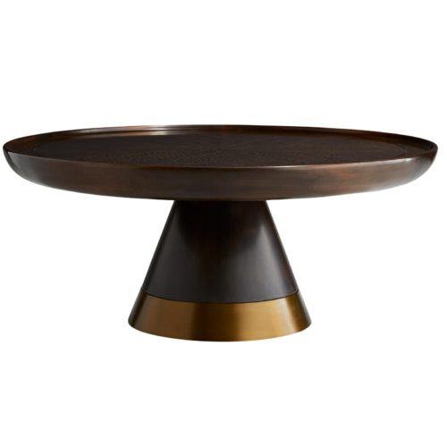brindle finish graces the eucalyptus veneer that forms the sizable surface of this piece. The large antique brass ring that surrounds the bottom of the wide pedestal base lifts the deep color