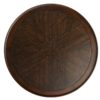 brindle finish graces the eucalyptus veneer that forms the sizable surface of this piece. The large antique brass ring that surrounds the bottom of the wide pedestal base lifts the deep color