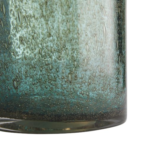 crafted in seeded glass, full of texture and movement, with dark smoke, rose smoke and teal smoke tones that recall jeweled treasures. Their magnificent height and scale give them presence in an awe-inspiring way.
