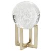 crystal orbs; these pieces feature their own qualities inclear, seeded and crackled textures. They are polished to a pristine orb and rest atop individual pedestals finished in antique brass.