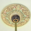 Rose ceiling medallion has a traditional design. This decorative medallion is a reproduction of the historical design.