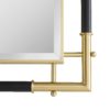 The details of this mirror's linear frame balance masculine and feminine aesthetics to create a refined statement piece. A reflective mirror trimmed with a beveled edge is surrounded by brass arms in a brushed finish that extend from the glassto create a see-through effect. Navy leather wrapping adorns segments of the brilliant metal frame, adding natural charm to its luxe appeal.