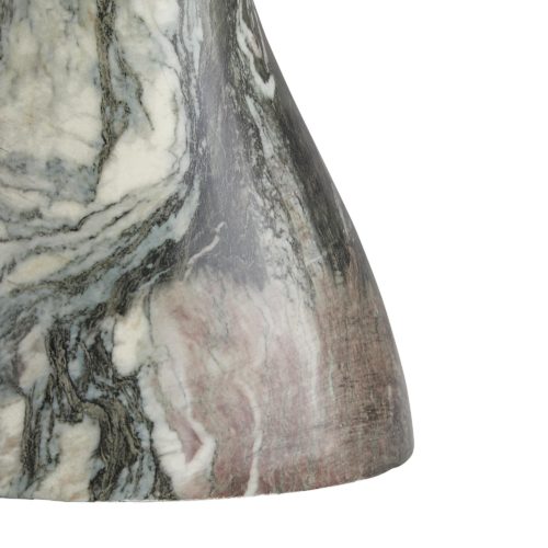 Made from light weight concrete, its marble-like façadeis made in a process called hydrographics. Since the process is done individually, each piece will have a look that varies slightly in veining and color scale.