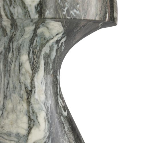 Made from light weight concrete, its marble-like façadeis made in a process called hydrographics. Since the process is done individually, each piece will have a look that varies slightly in veining and color scale.