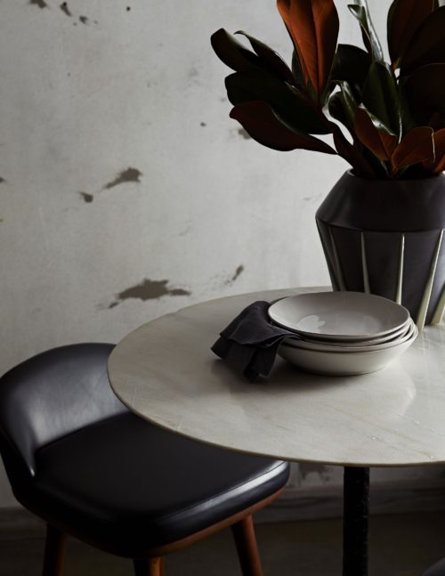 The beveled edges of the marble top add depth to the slight veining that moves freely across the surface. Though larger in size, this table has a small footprint like its predecessor, making it a great piece for small space.