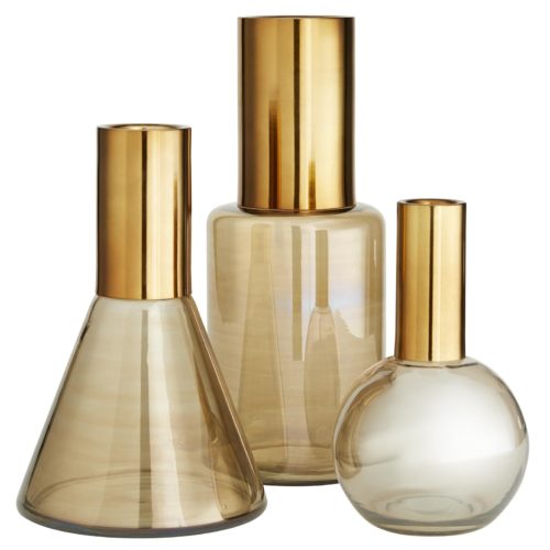 Modern in form, smoke luster glass with antique brass necks unite to create eachindividually shaped piece. These watertight vases are a sophisticated way to showcase beautiful blooms.