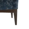 Upholstered in a peacock chenille fabric, the wood frame features a high back that seamlessly flows into the subtly sloped arms and downto the walnut-finished tapered legs. A slight incline visually accents its timeless silhouette, while providing ample support. Perfect as a pair or on its own in a living area or stylish study.