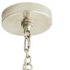 Chandelier with steel arms in an antique silver finish that curve upwards from a center point at two different heights to create a double tier effect.