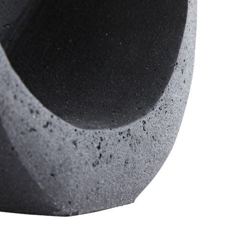 The artistry of sculptural work is showcased in the uniqueness of this ricestone form. Carved in a teardrop shape, one side prominently peaks over the top in a sweeping fashion, delivering an unexpectedabstract quality to this statuesque piece. A charcoal finish delivers a moody aesthetic and modernizes its natural composition
