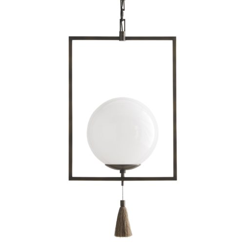 Orb and Tassel Pendant emulates a sleek steel trapeze finding equilibrium with its glowing glass orb. A fine-threaded tassel hangs from the center of the aged bronze fixture. She betrays the family secret of balance and elegant form. Finished in aged bronze