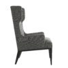 Wing Chair is proof that style does not have to sacrifice comfort. The modern wingback frame is juxtaposed with elegant tufting on the back. A taller chair can add variety and break a room up--perfect as a pair for dramatic styling or on its own. Covered in Soot Diagonal Tweed, a transitional fabric with neutral undertones.