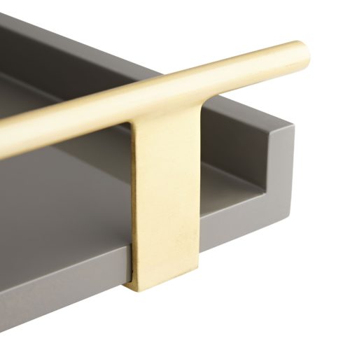 Form meets function to create this modern serving tray. A chateau gray lacquer finish is balanced by antique brass handles that offer a practical and polishedappeal—an optimal serving piece when hosting casual or formal functions.