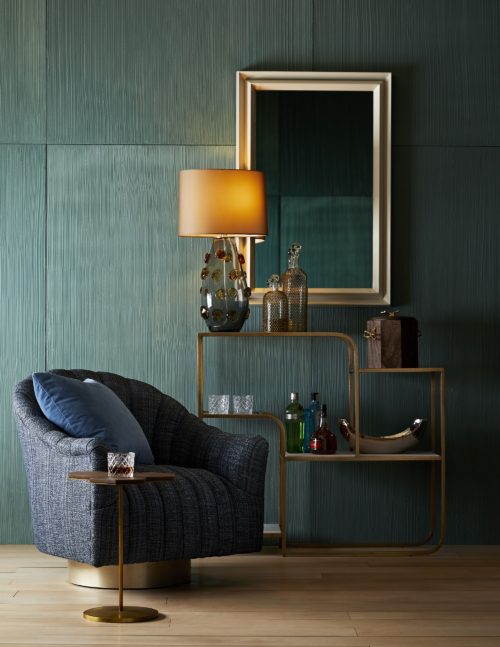 Chic and classy, this modern living space showcases the chenille swivel chair with the classic short etagere with sexy curves.