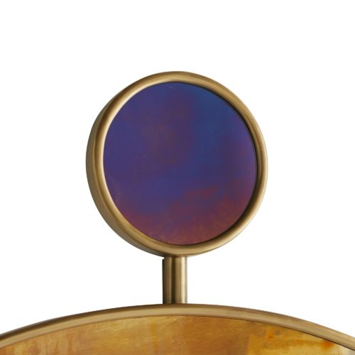 The Moon Glow’s stacked mirrors are a representation of a celestial space when the planets perfectly align - only seen through a clear night sky over the vast playa. The mini mirrorbalanced over the large circular antique brass frame features a deep plum hue while the large mirror boasts a stained antique finish. Antiquing is hand-applied and will vary. It hangs sturdy and flush to the wall using a security cleat mount.