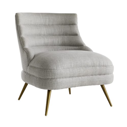 Designed for comfort in every way, the sleek channeled form with the farrow linen and tapered antique brass legs are elegantly effortless.