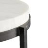 We love the yin and yang on this transitional side table. Hand-forged black iron legs are delicately tapered creating the perfect base for the chunky white marble top.
