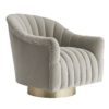 Contemporary velvet swivel chair. Swivel chair is a chic addition to any contemporary Art Deco inspired home. Swivel chair has beautiful champagne finish.