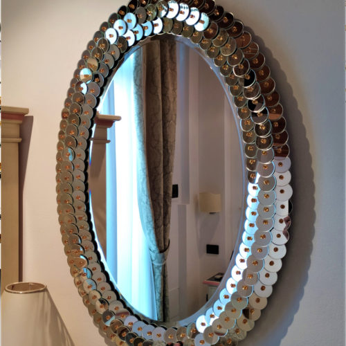 Oval Venetian Mirror with running coin and amber border